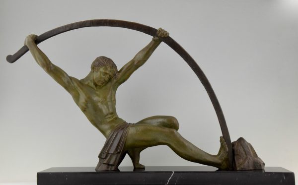 Art Deco sculpture athletic man bending a bar