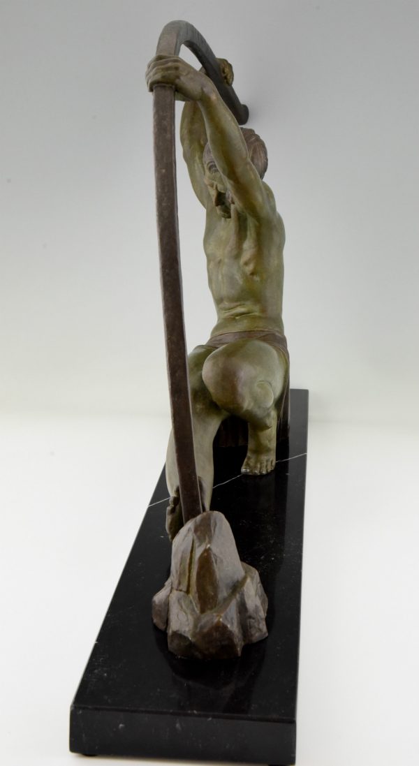 Art Deco sculpture athletic man bending a bar