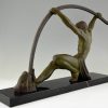 Art Deco sculpture athletic man bending a bar