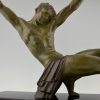 Art Deco sculpture athletic man bending a bar