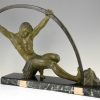 Art Deco sculpture “l’age du bronze” homme avec barre