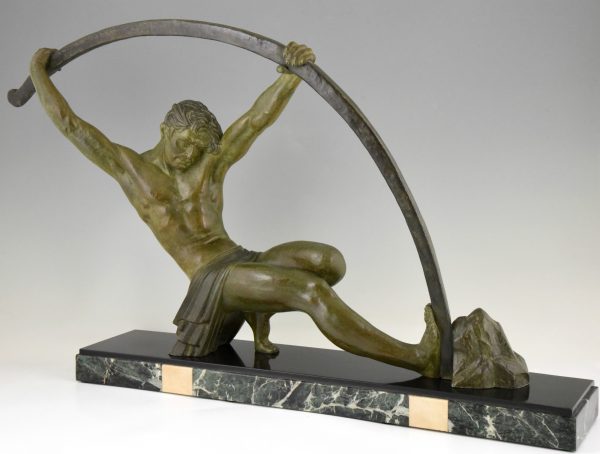 Art Deco sculpture “l’age du bronze” homme avec barre