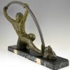 Art Deco sculpture “l’age du bronze” homme avec barre