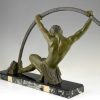 Art Deco sculpture “l’age du bronze” homme avec barre