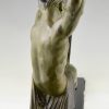 Art Deco sculpture “l’age du bronze” homme avec barre