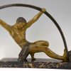 Art Deco sculpture “l’age du bronze” homme avec barre