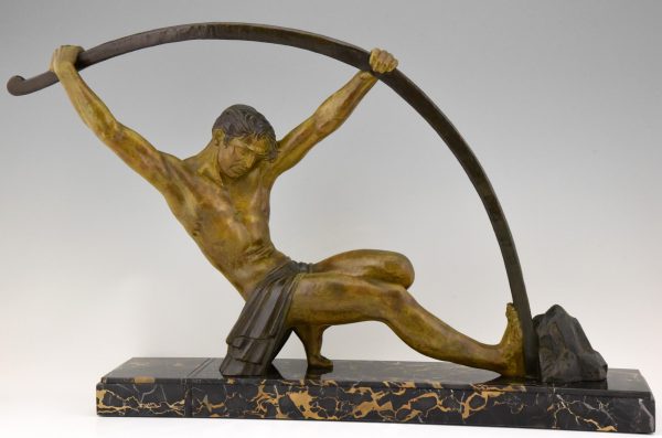 Art Deco sculpture “l’age du bronze” homme avec barre