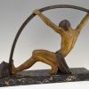 Art Deco sculpture “l’age du bronze” homme avec barre