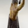 Art Deco sculpture “l’age du bronze” homme avec barre