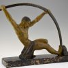 Art Deco sculpture “l’age du bronze” homme avec barre