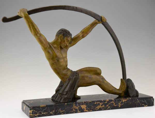 Art Deco sculpture “l’age du bronze” homme avec barre