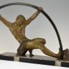 Art Deco sculpture “l’age du bronze” homme avec barre