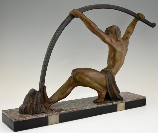 Art Deco sculpture “l’age du bronze” homme avec barre