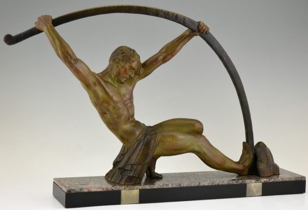 Art Deco sculpture “l’age du bronze” homme avec barre