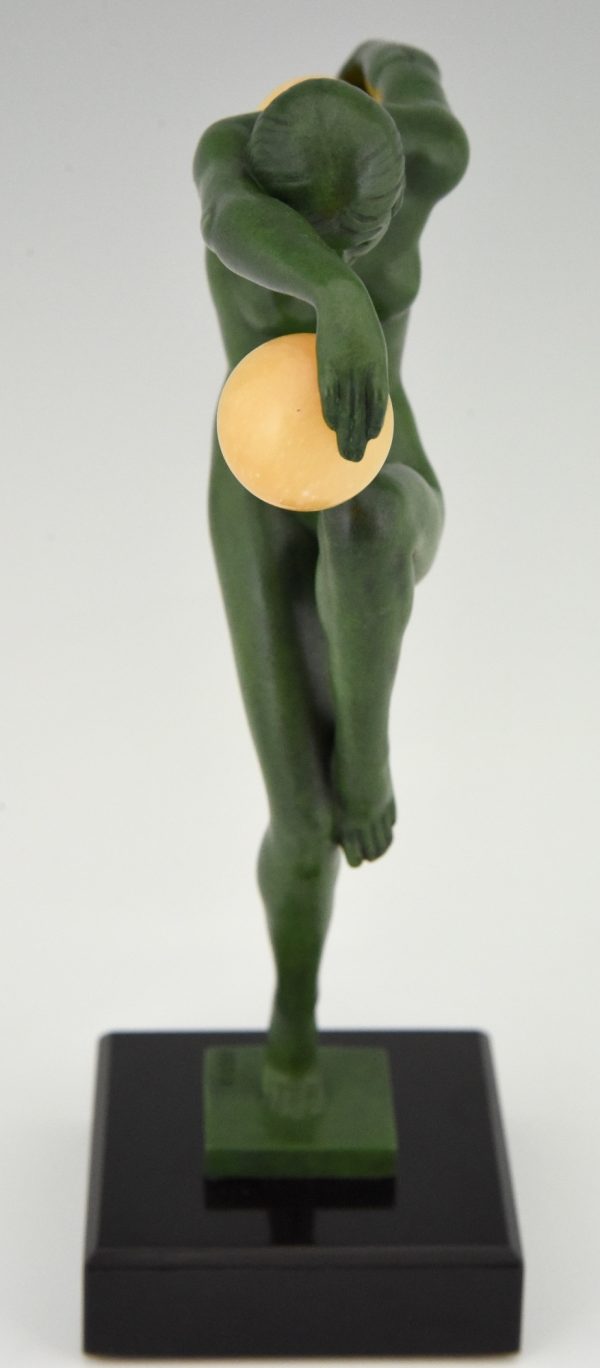 Art Deco sculpture of a nude dancer with balls