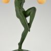 Art Deco sculpture of a nude dancer with balls