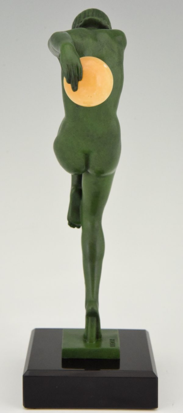 Art Deco sculpture of a nude dancer with balls