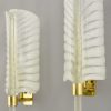 Pair of feather shaped glass and gilt brass sconces