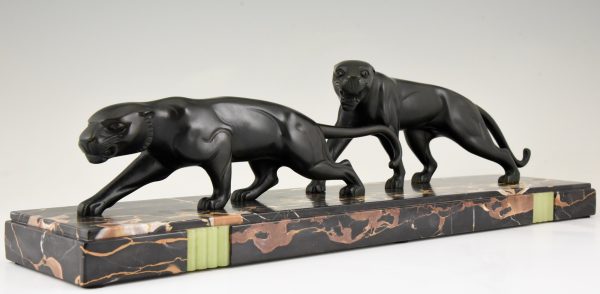 Art Deco bronze sculpture of two panthers