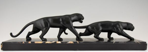 Art Deco bronze sculpture of two panthers