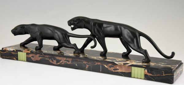 Art Deco bronze sculpture of two panthers