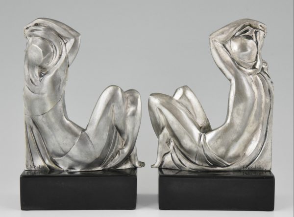 Art Deco bronzen boekensteunen met naakte vrouwen