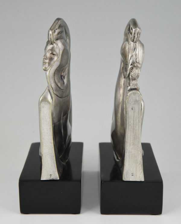 Art Deco bronzen boekensteunen met naakte vrouwen