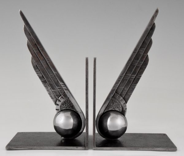 Art Deco wing and ball wrought iron bookends