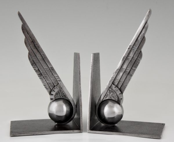 Art Deco wing and ball wrought iron bookends