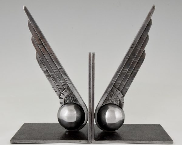 Art Deco wing and ball wrought iron bookends