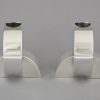 Art Deco Modernist pair of silvered candlesticks.