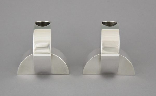 Art Deco Modernist pair of silvered candlesticks.