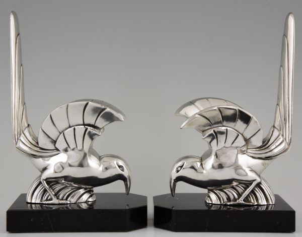 A pair of Art Deco silvered bird bookends.