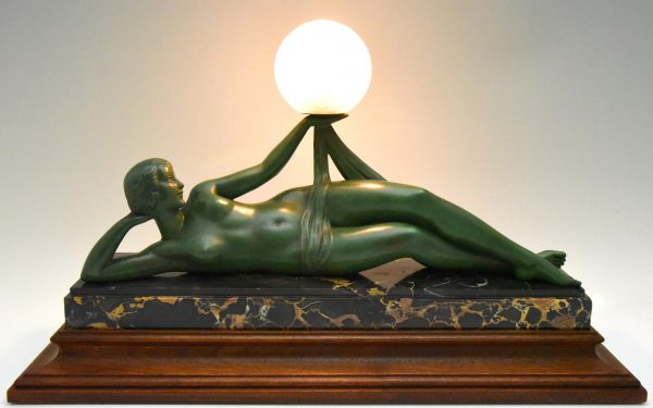 Aube Art Deco lamp draped nude holding a glass globe
