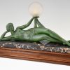 Aube Art deco lampe femme nue tenant une globe en verre