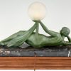 Aube Art deco lampe femme nue tenant une globe en verre