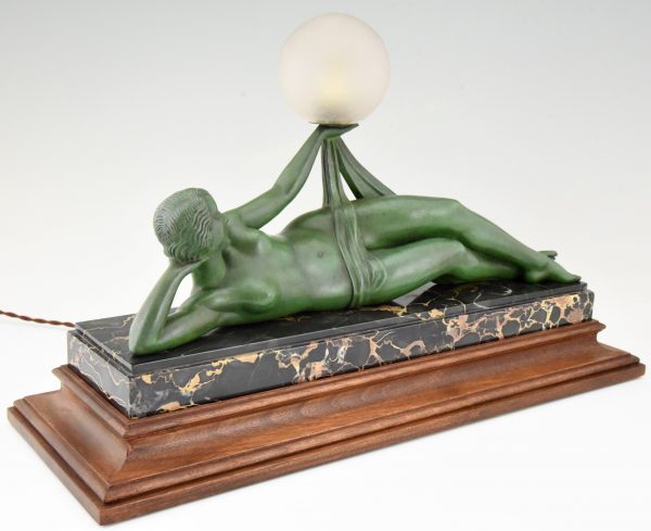 Aube Art Deco lamp draped nude holding a glass globe