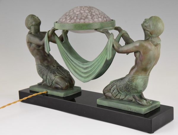 Art Deco lamp kneeling nudes holding a glass shade