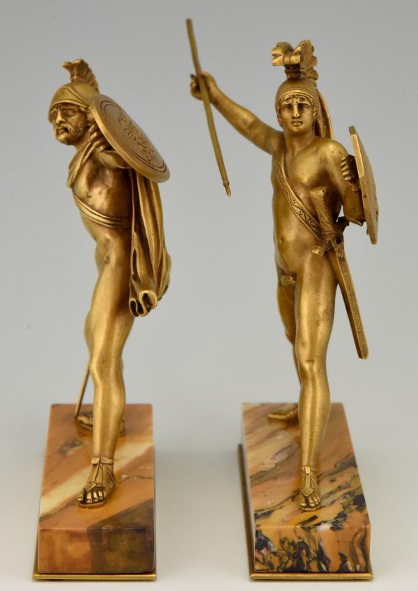 Bronze bookends Roman warriors with dagger, shield and helmet