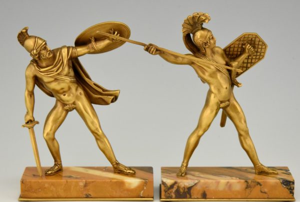 Bronze bookends Roman warriors with dagger, shield and helmet