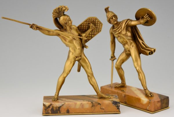 Bronze bookends Roman warriors with dagger, shield and helmet