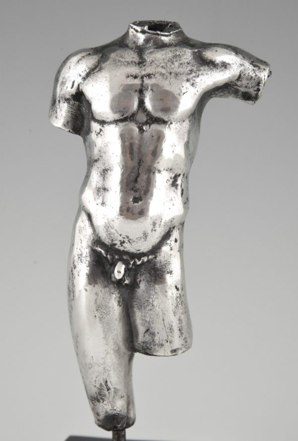 Antique silver sculpture male nude torso.