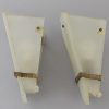 A pair of Art Deco glass and bronze wall lights or sconces