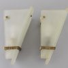 A pair of Art Deco glass and bronze wall lights or sconces