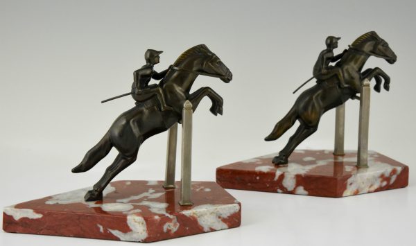 Art Deco bookends jockey on jumping horse.