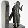 Art Deco boekensteunen golfer en caddy