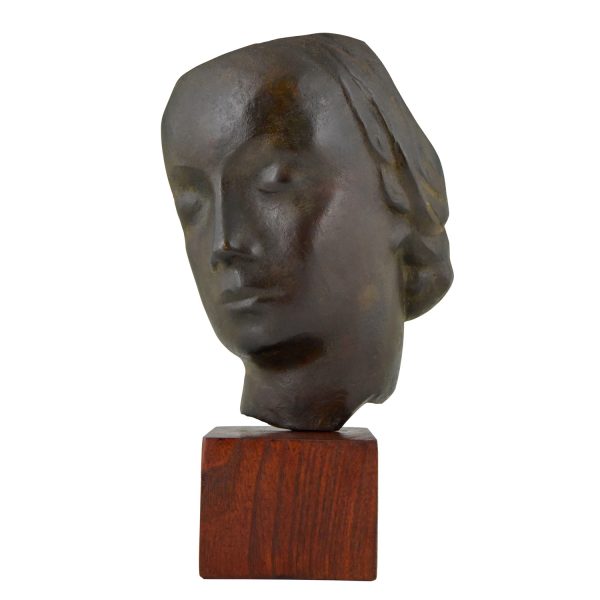 Art Deco bronze sculpture of a woman’s face