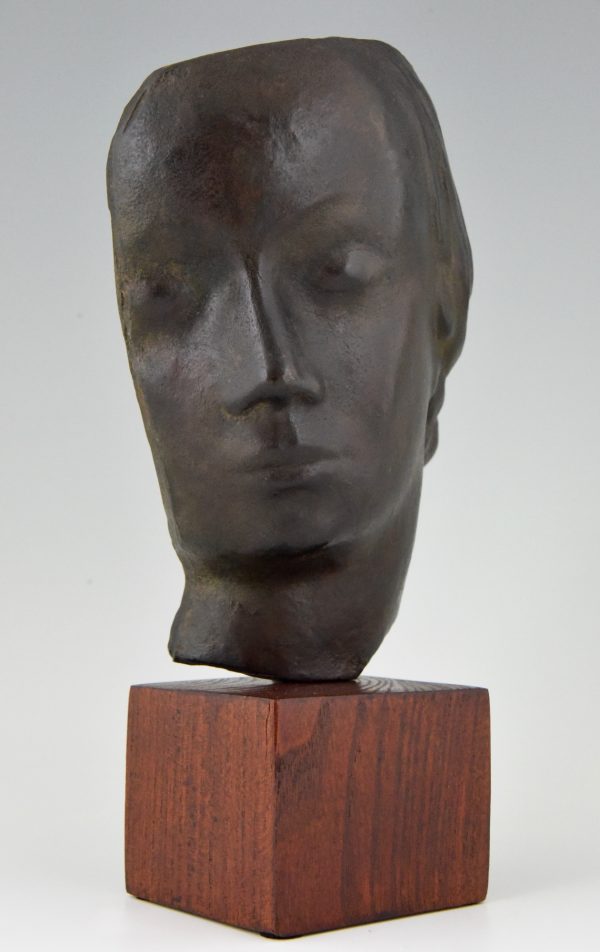 Art Deco bronze sculpture of a woman’s face