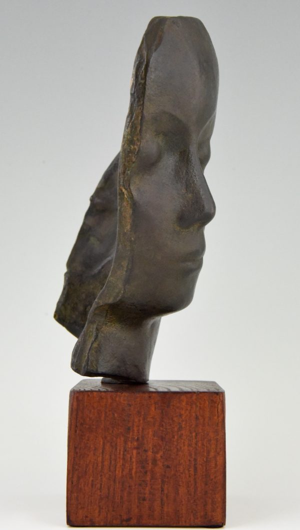 Art Deco bronze sculpture of a woman’s face