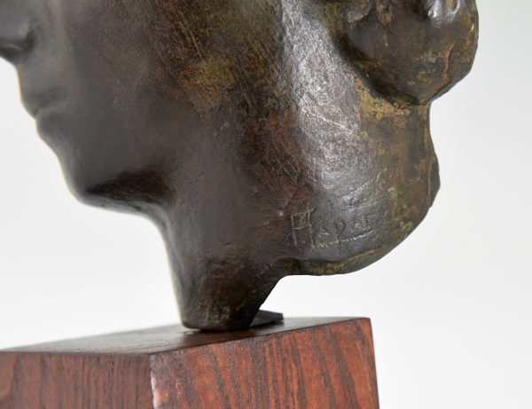 Art Deco bronze sculpture of a woman’s face